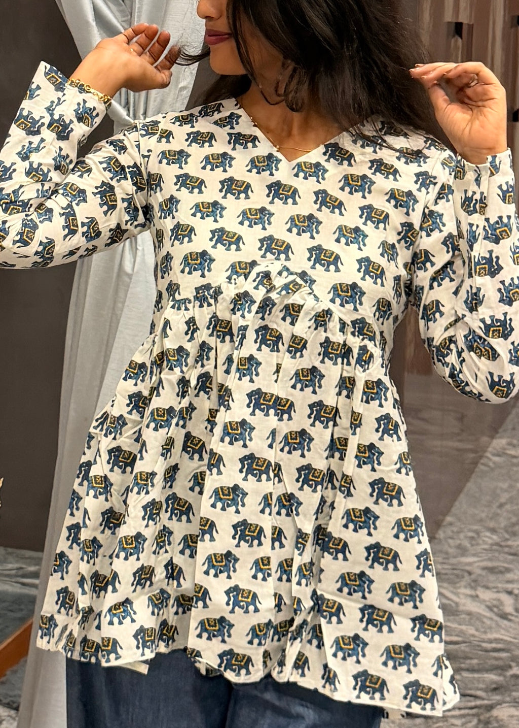 Blue elephant white peplum top