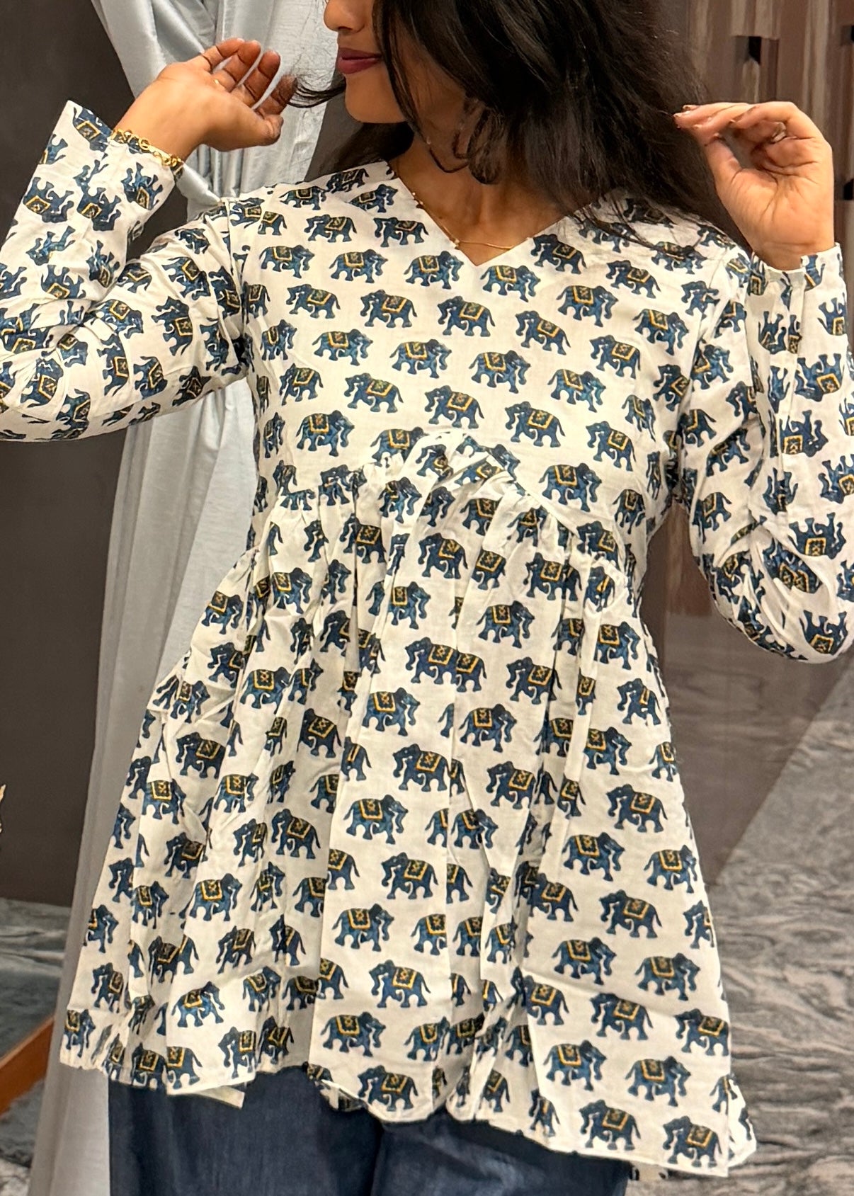 Blue elephant white peplum top