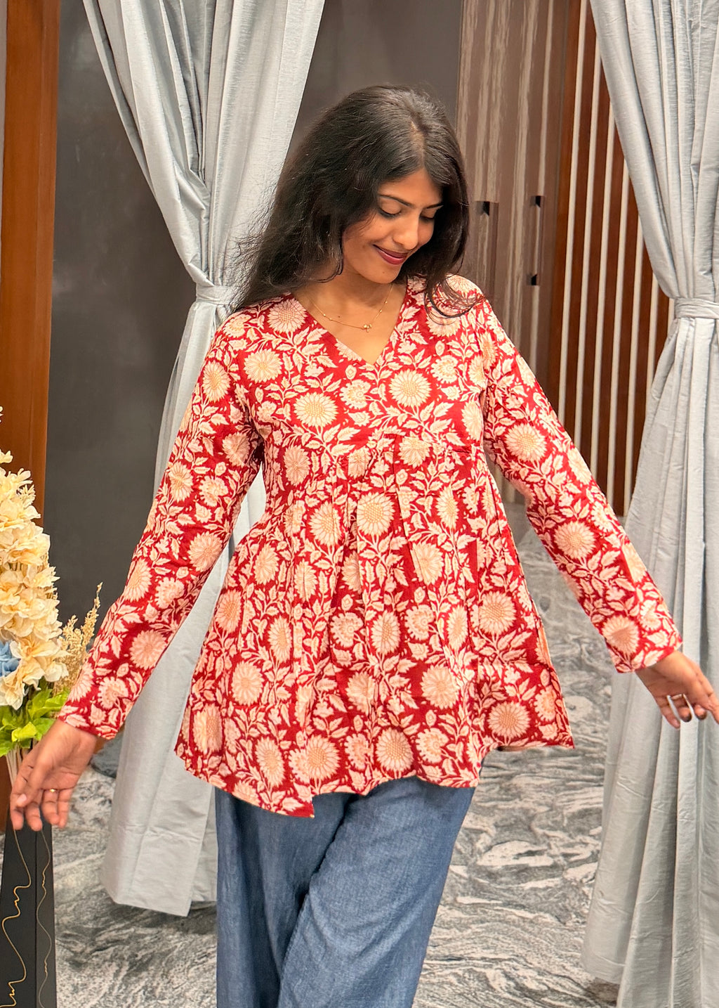 Red floral peplum top