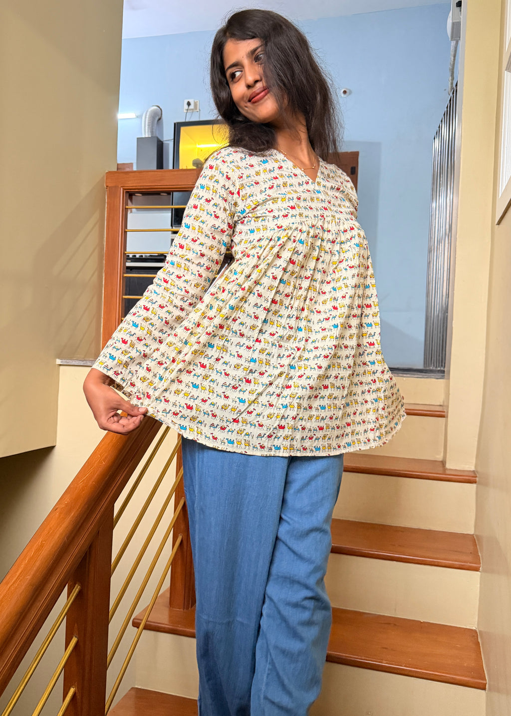 Camel printed peplum top
