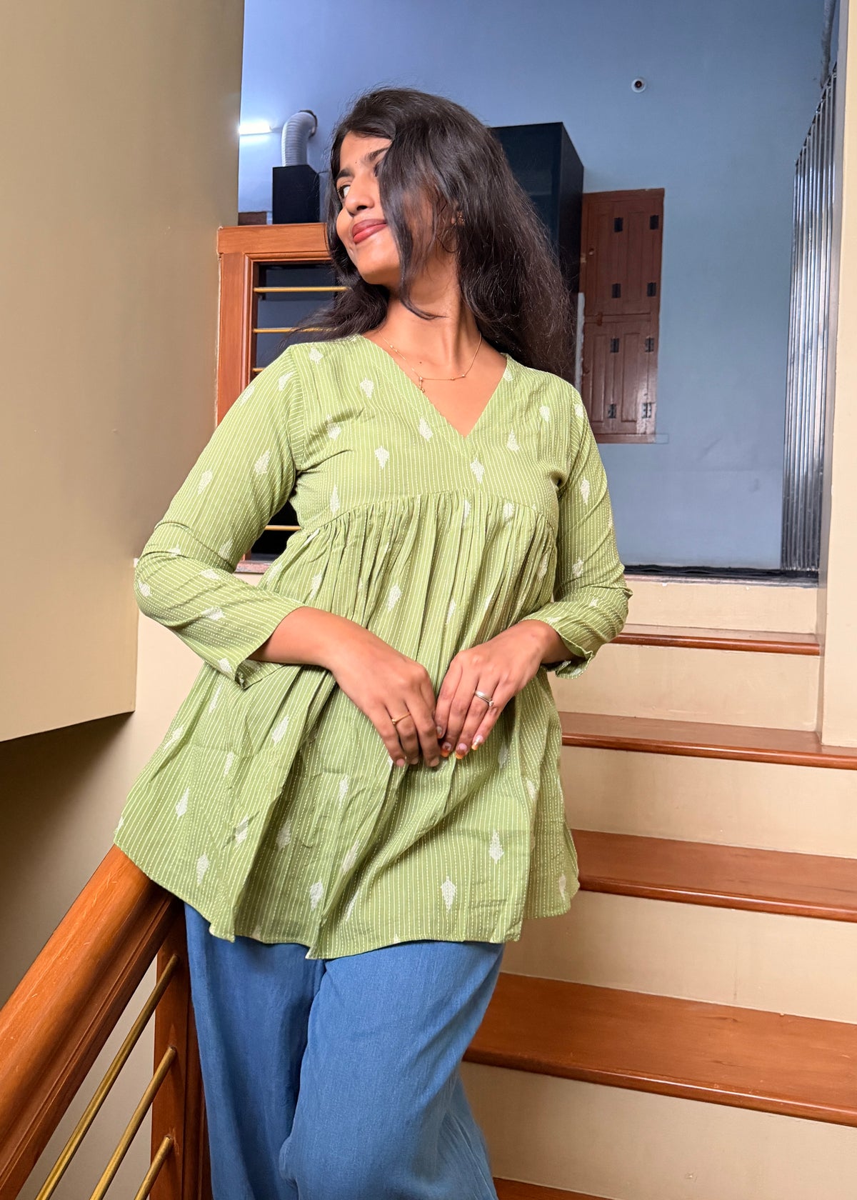 Pastel green peplum top