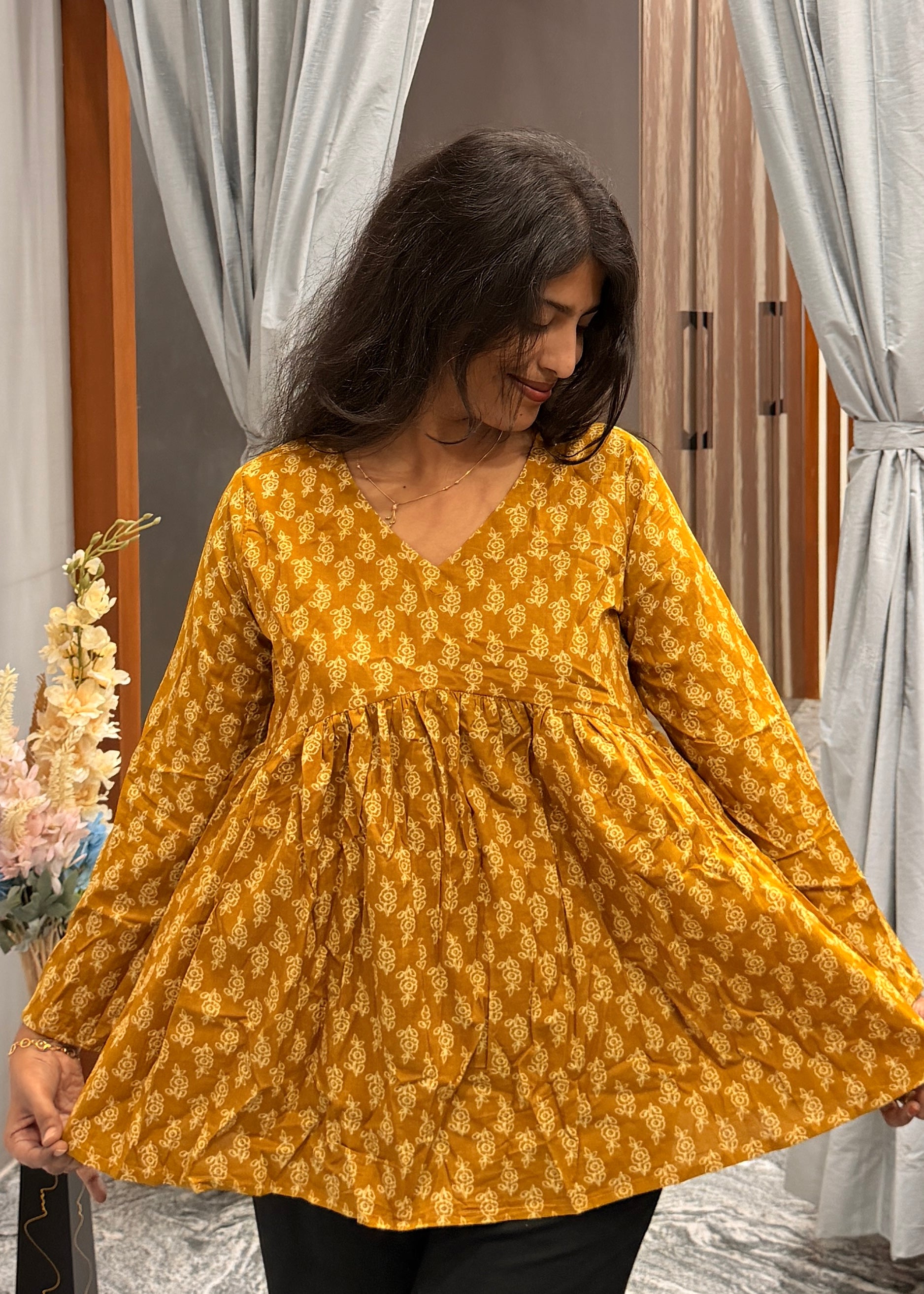 Yellow peplum top