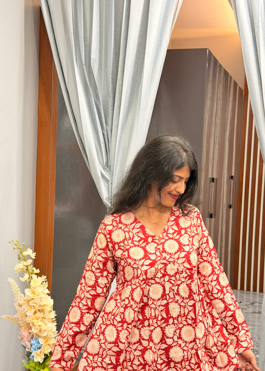 Red floral peplum top