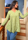 Pastel green peplum top
