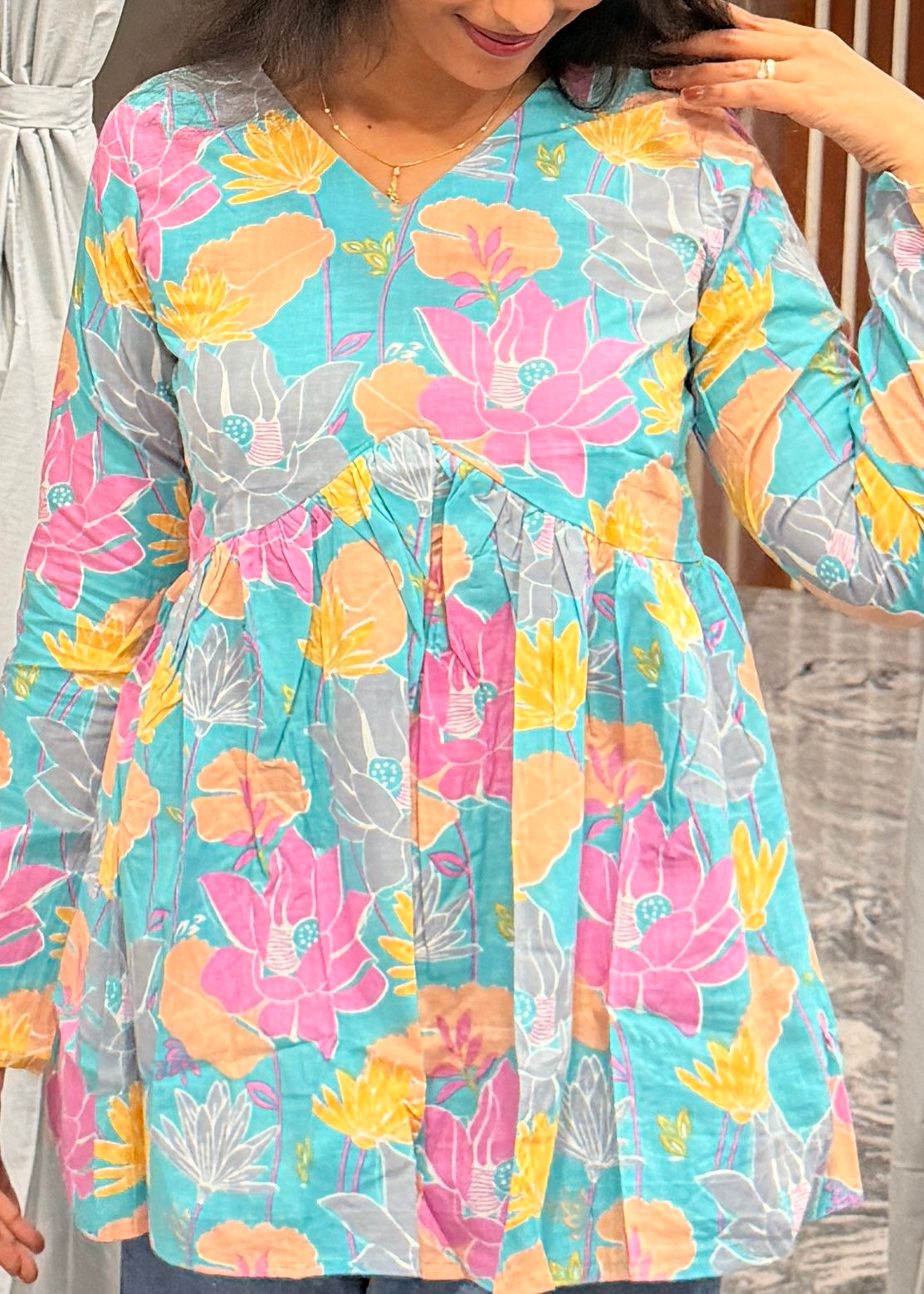Blue floral peplum top