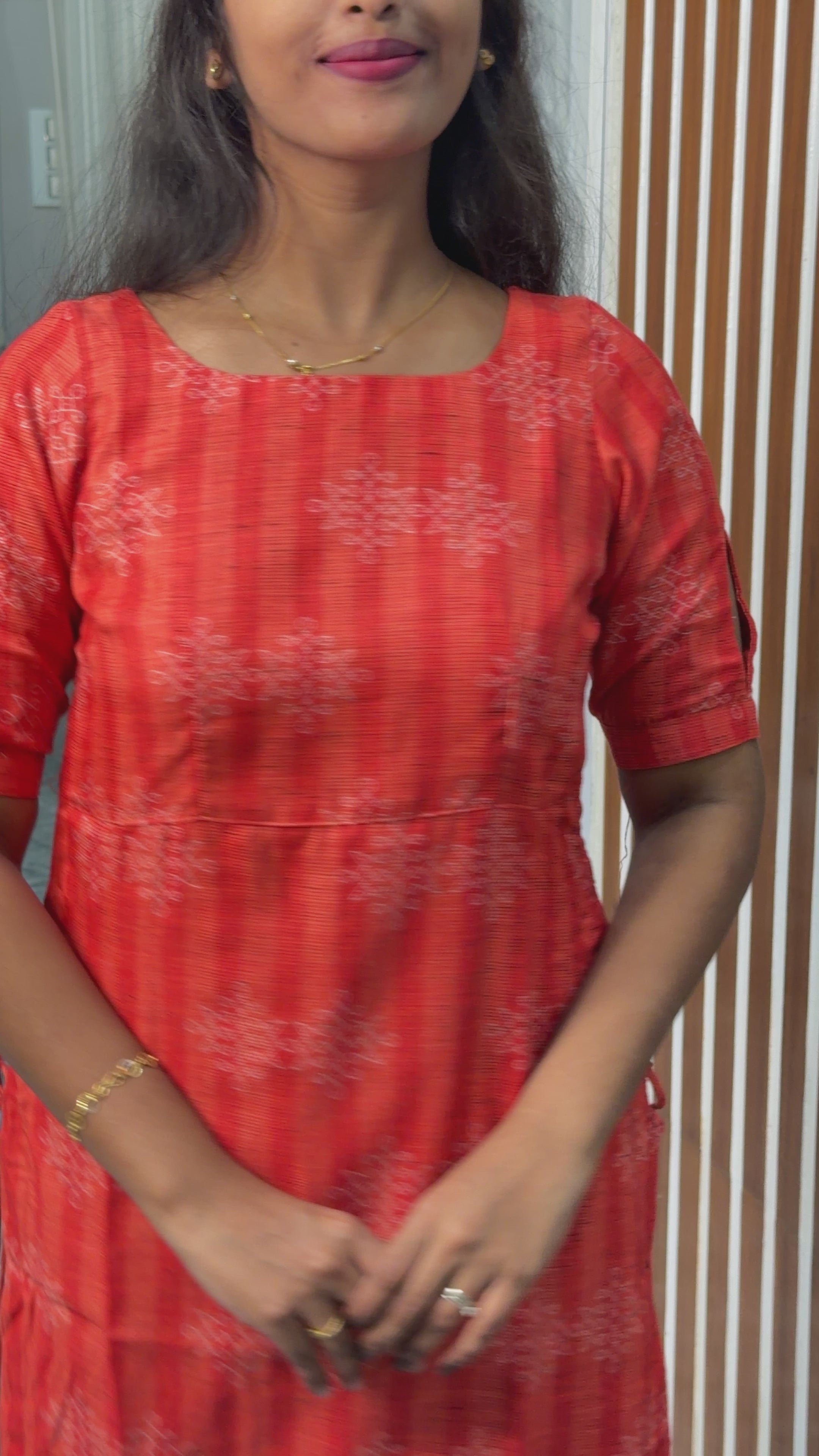 Orange sideknot kurti ( kollam print )